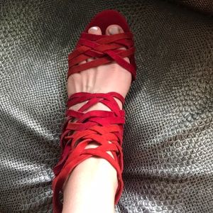 Red strappy Anthropology ankle booties sandal